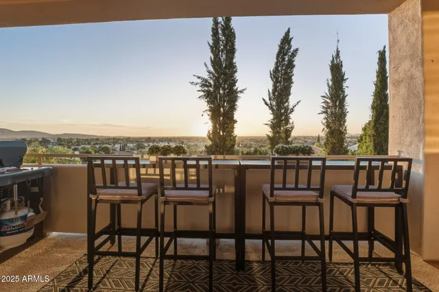a living room with furniture and a gate
