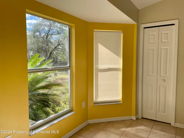 a view of a room that has a window