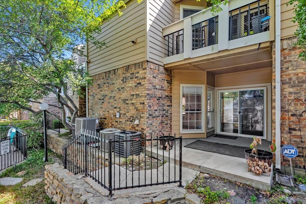 14277 Preston Road, Unit C315 Dallas, TX 75254 - Photo 26 of 26 Back patio with walkway to community pool