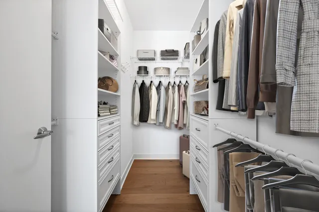 a kitchen with cabinets and a stove