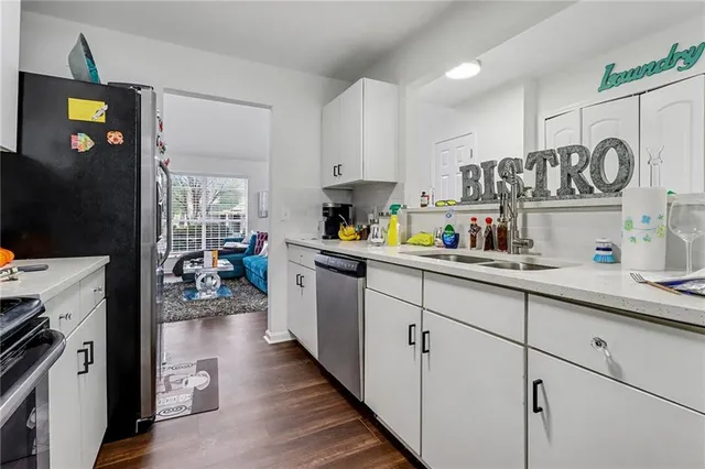 a view of a dining room with furniture and window