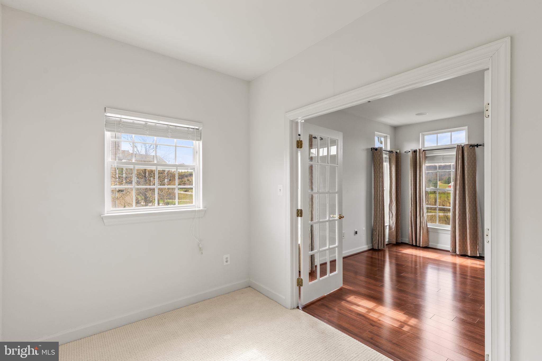 28 Fawn Hill Road Hanover, PA 17331 - Photo 18 of 69 an empty room with wooden floor and windows
