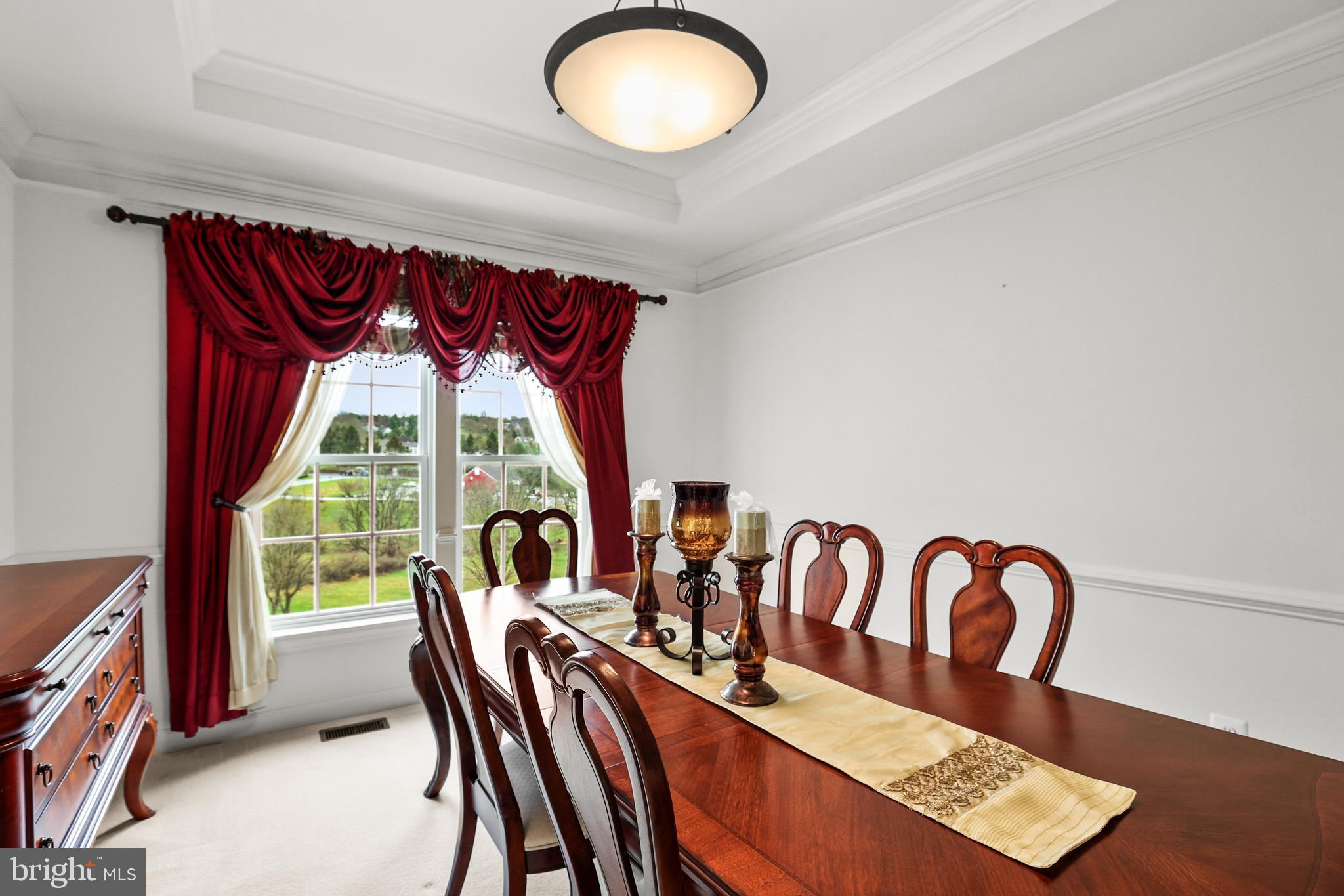 28 Fawn Hill Road Hanover, PA 17331 - Photo 27 of 69 a view of a dining room with furniture window and outside view