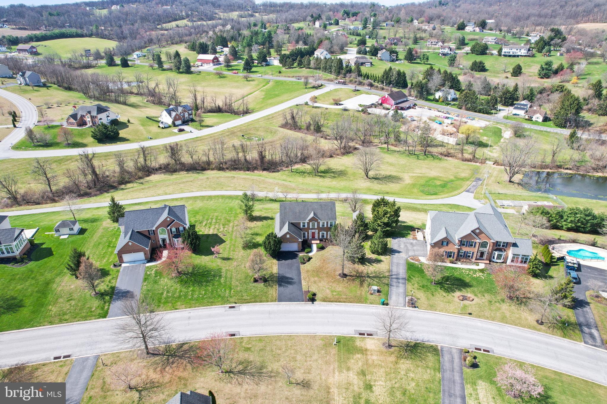 28 Fawn Hill Road Hanover, PA 17331 - Photo 4 of 69 an aerial view of a house with a garden and lake view