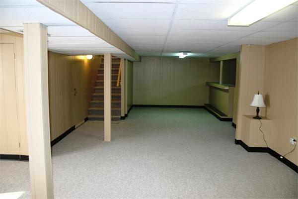 945 Wilbraham Road Springfield, MA 01109 - Photo 10 of 16 a view of an empty room with a window