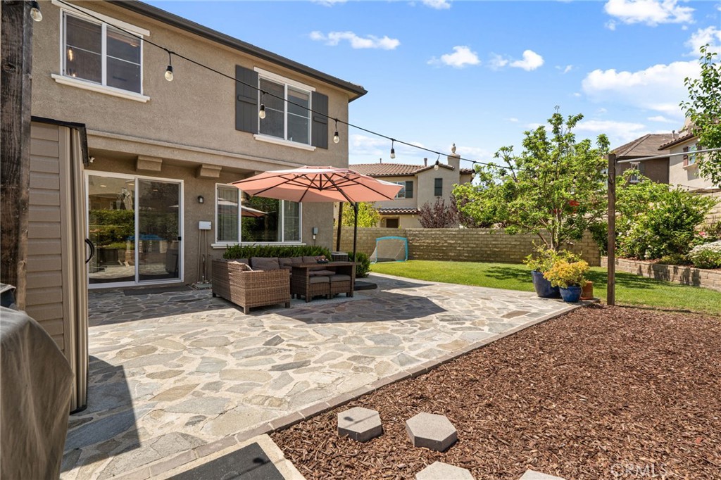 28356 Santa Rosa Lane Saugus, CA 91350 - Photo 3 of 50 a view of a house with backyard and sitting area