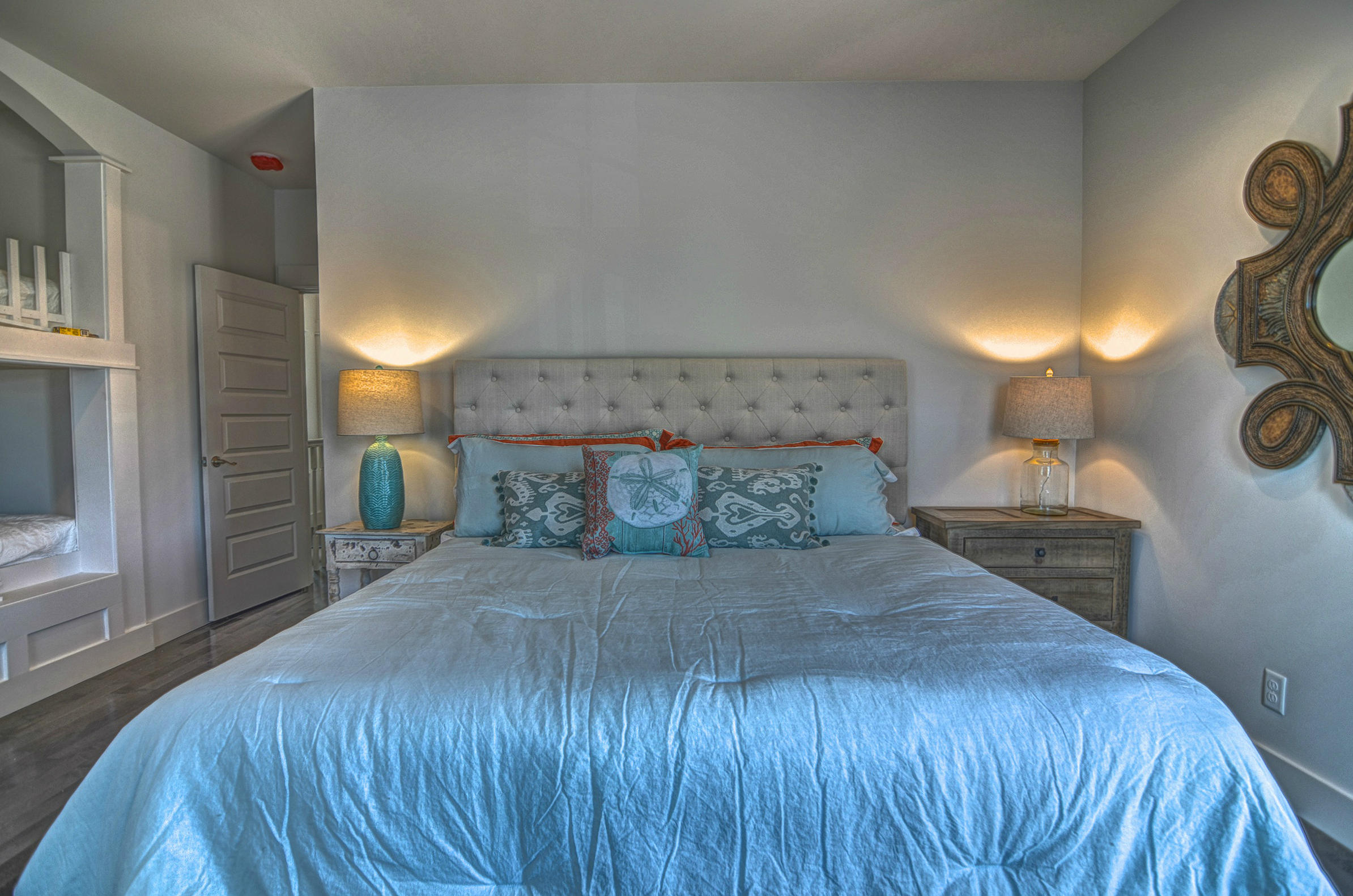 115 West Cobia Run Seacrest, FL 32461 - Photo 15 of 26 a bed sitting in a bedroom next to a window