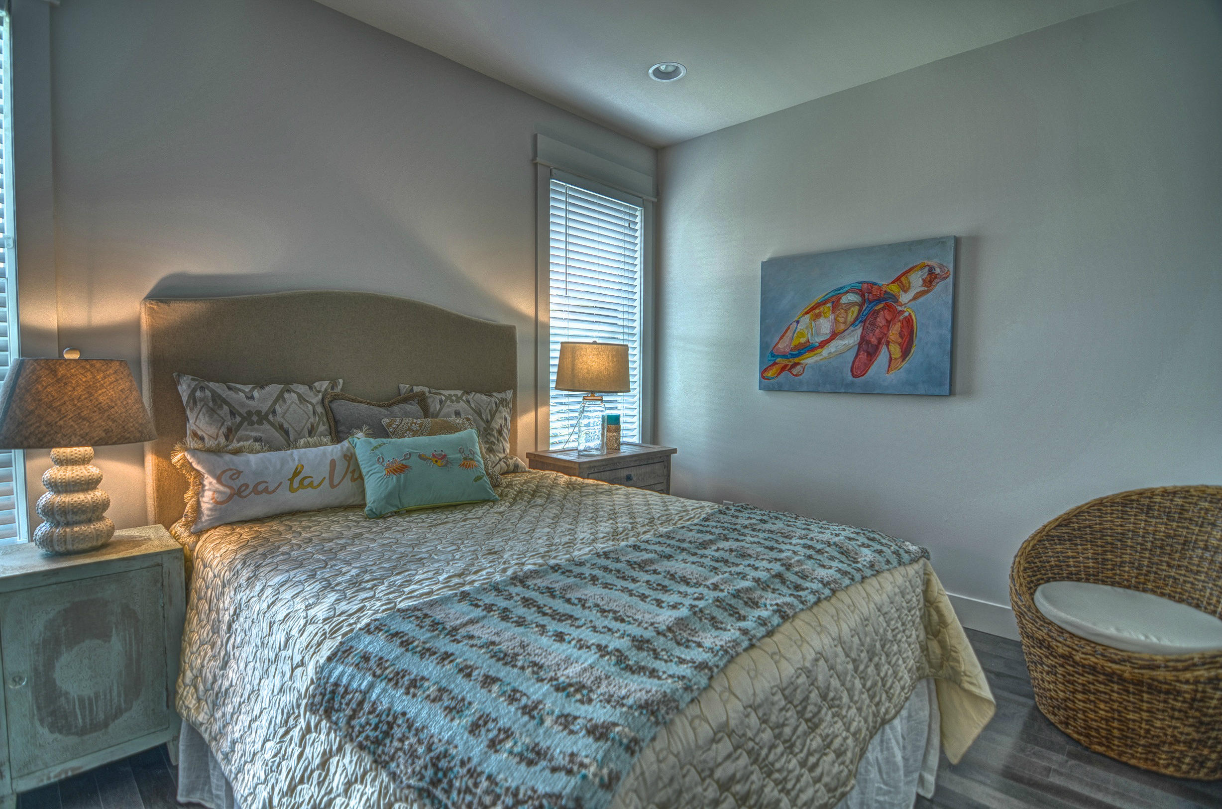 115 West Cobia Run Seacrest, FL 32461 - Photo 16 of 26 a bedroom with a bed and wooden floor