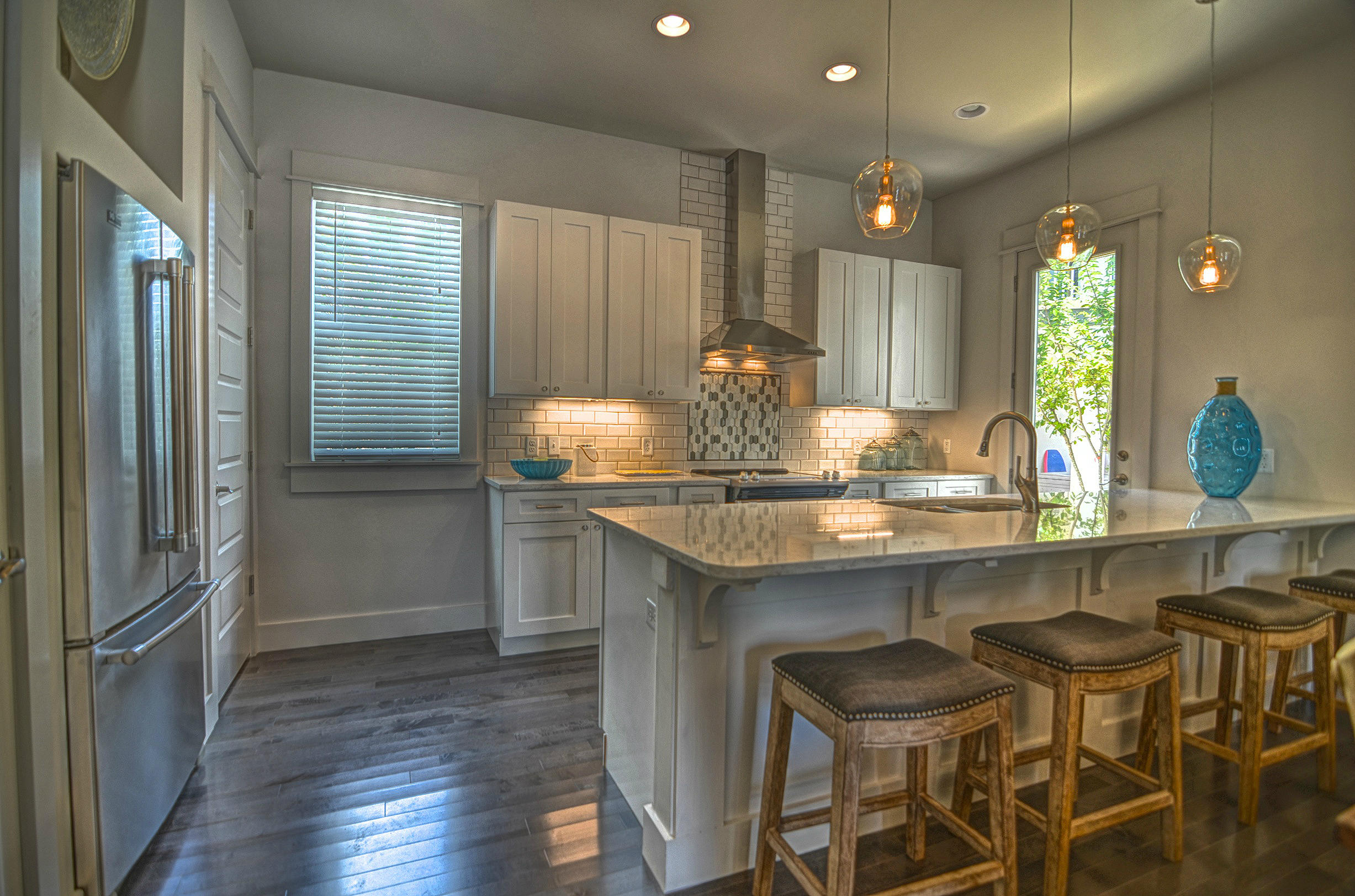 115 West Cobia Run Seacrest, FL 32461 - Photo 8 of 26 a kitchen with granite countertop counter space and stainless steel appliances