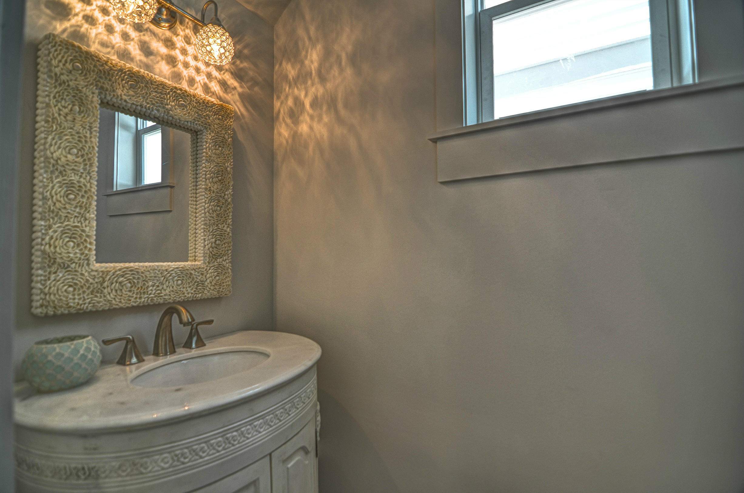 115 West Cobia Run Seacrest, FL 32461 - Photo 9 of 26 a bathroom with a sink and a mirror