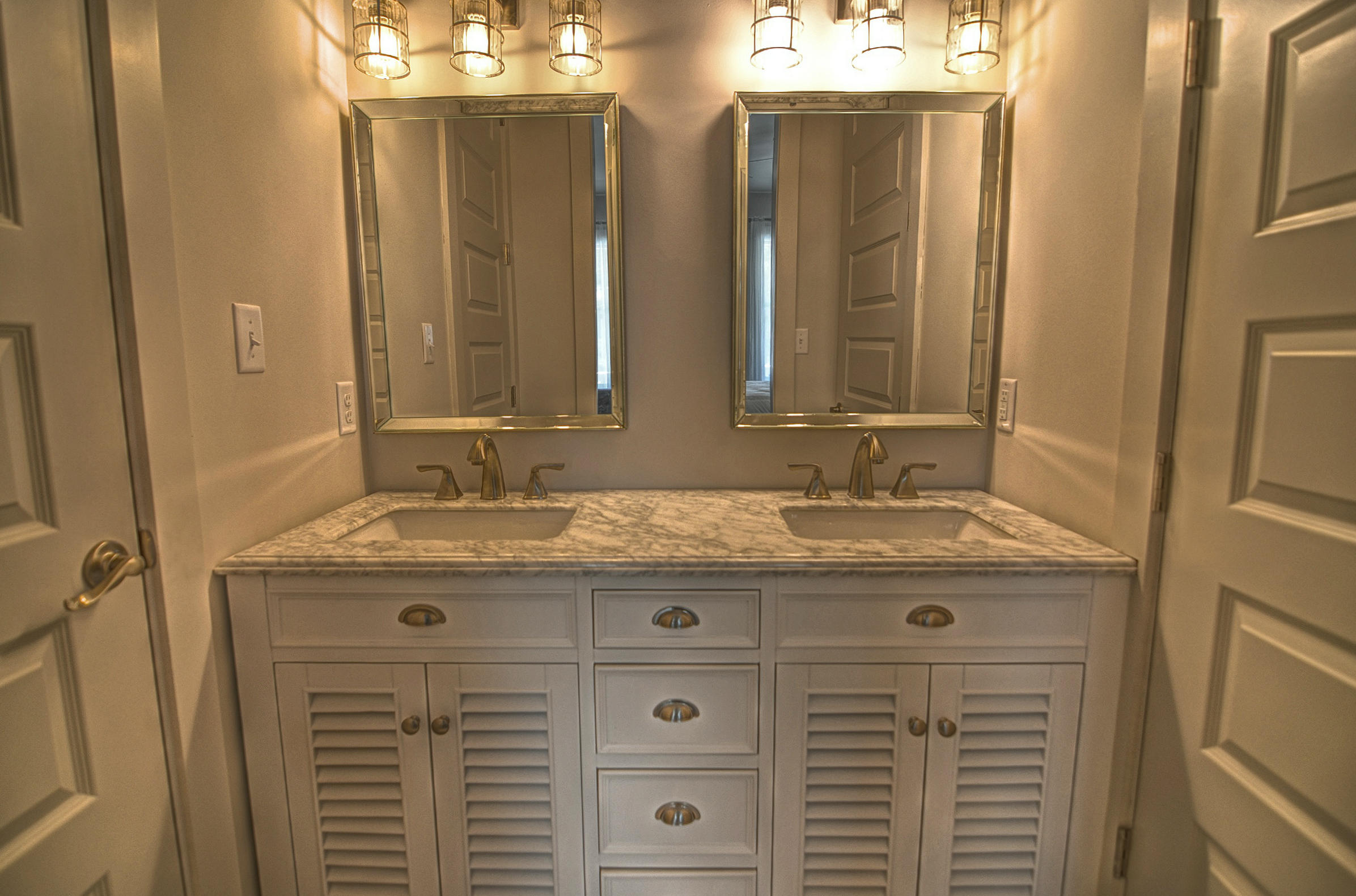 115 West Cobia Run Seacrest, FL 32461 - Photo 10 of 26 a bathroom with a granite countertop sink and a mirror