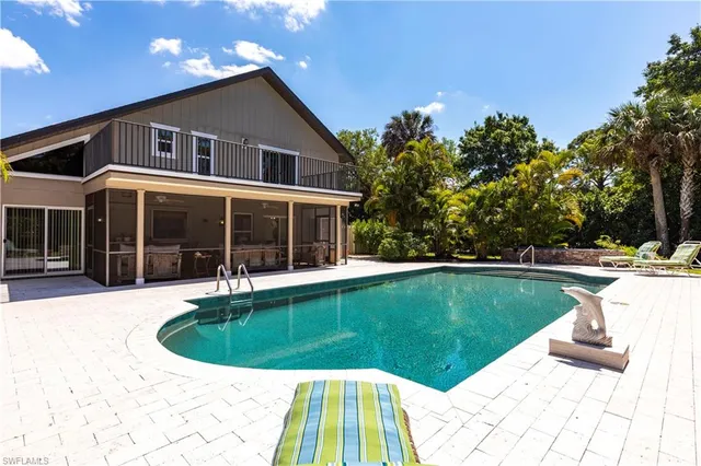 a view of a house with a swimming pool