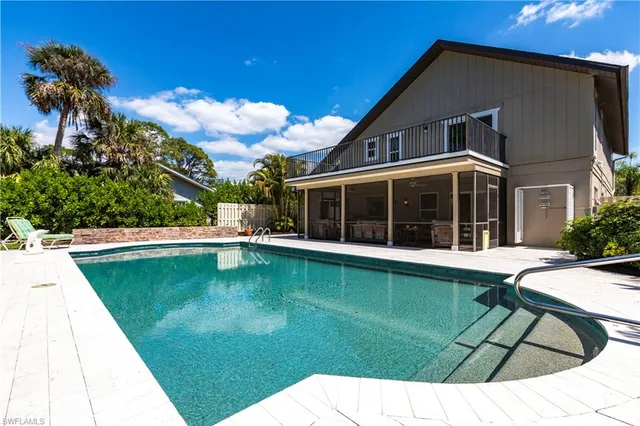 a view of a house with swimming pool