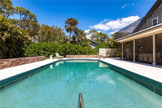 a view of a back yard of the house