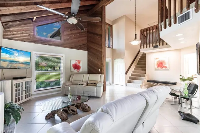 a room with furniture and a fireplace