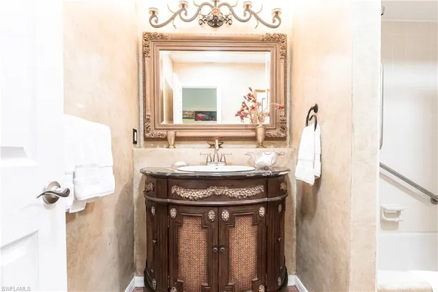 a spacious bedroom with a bed and window