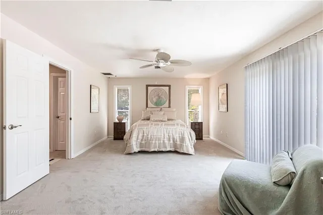 a en suite bathroom with 2 sink double vanity and a mirror