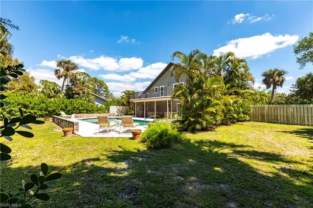 a view of a house with a swimming pool