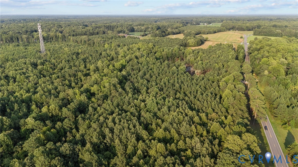 1 Va-54 Montpelier, VA 23192 - Photo 9 of 15 an aerial view of residential houses with outdoor space and trees
