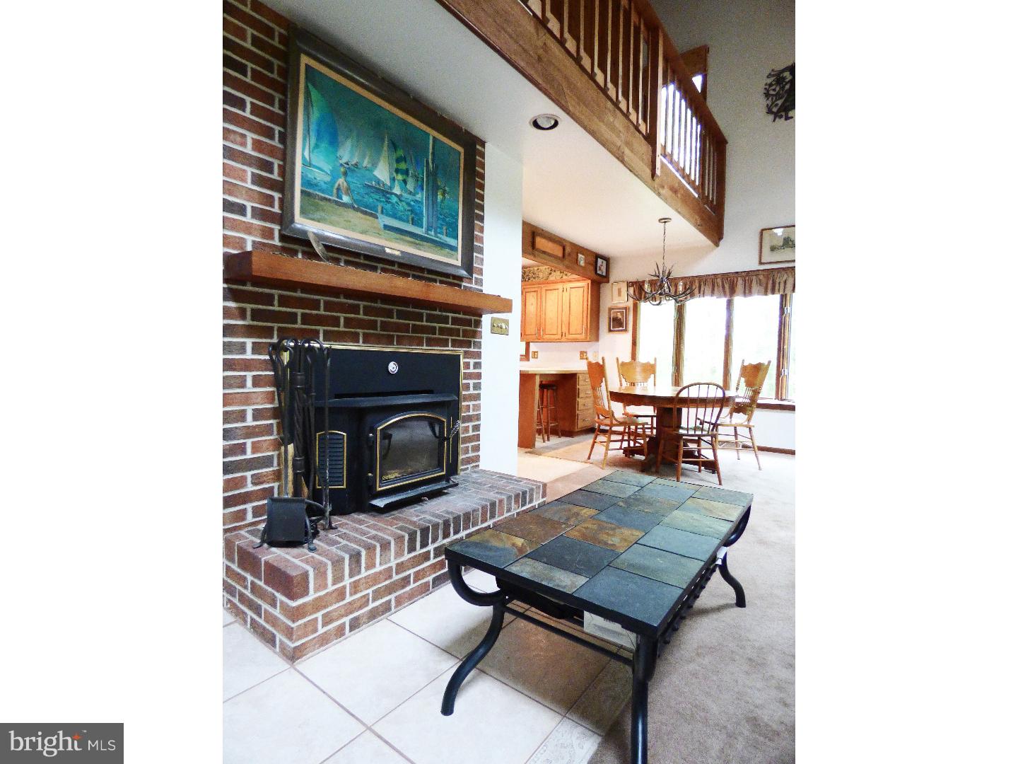 124 Alloway-Woodstown Road Alloway, NJ 08098 - Photo 14 of 25 a living room with furniture and a fireplace