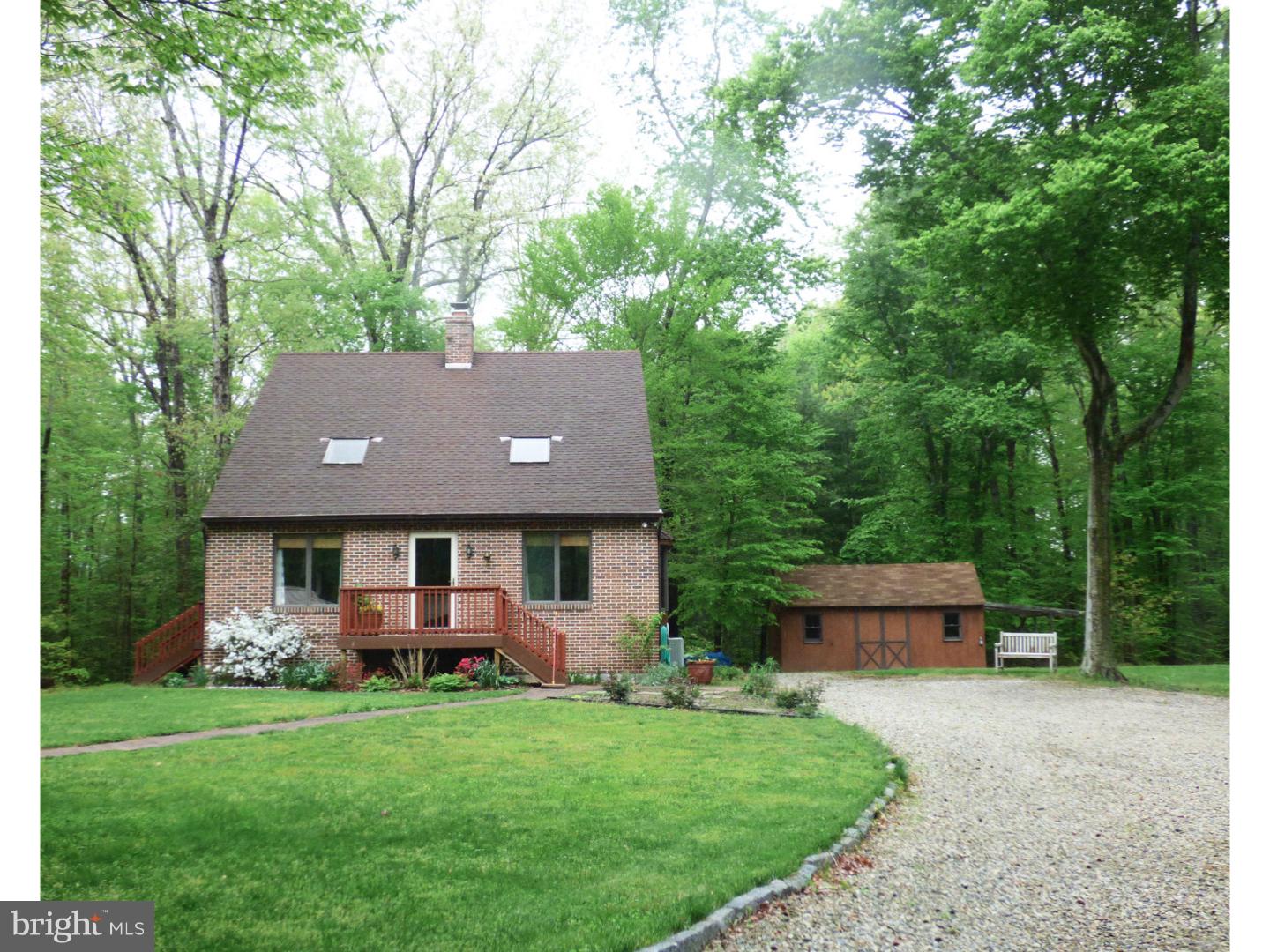 124 Alloway-Woodstown Road Alloway, NJ 08098 - Photo 3 of 25 a front view of house with a garden