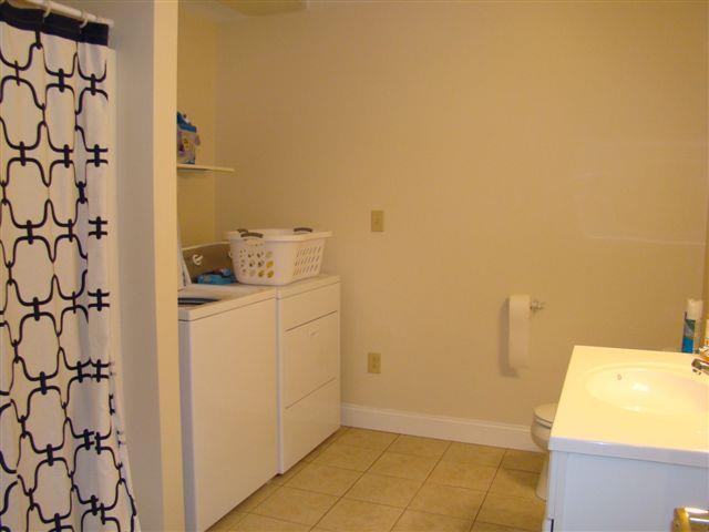 1022 North Ridge Road, Unit 1022 Carrabassett Valley, ME 04947 - Photo 19 of 27 Common bath with laundry.