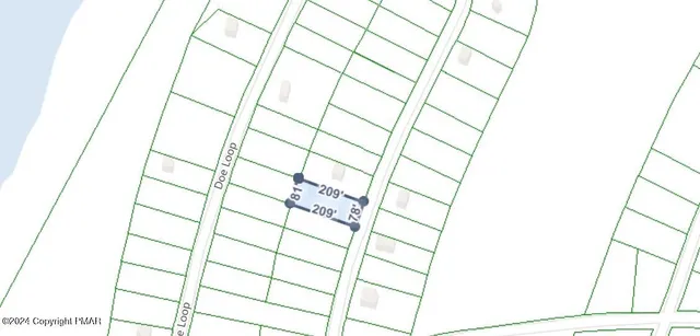 a backyard of a house with large trees