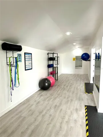 a view of a room with gym equipment