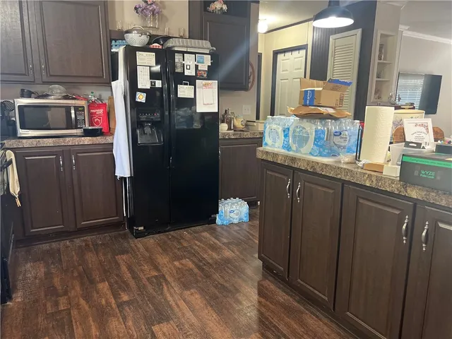 a room with cabinets and washer