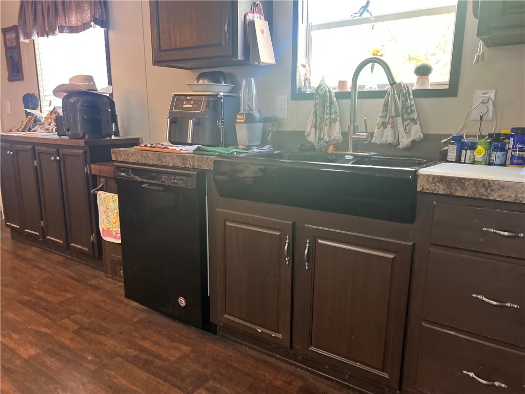 802 1st Street Bayside, TX 78340 - Photo 12 of 22 a room with cabinets and washer