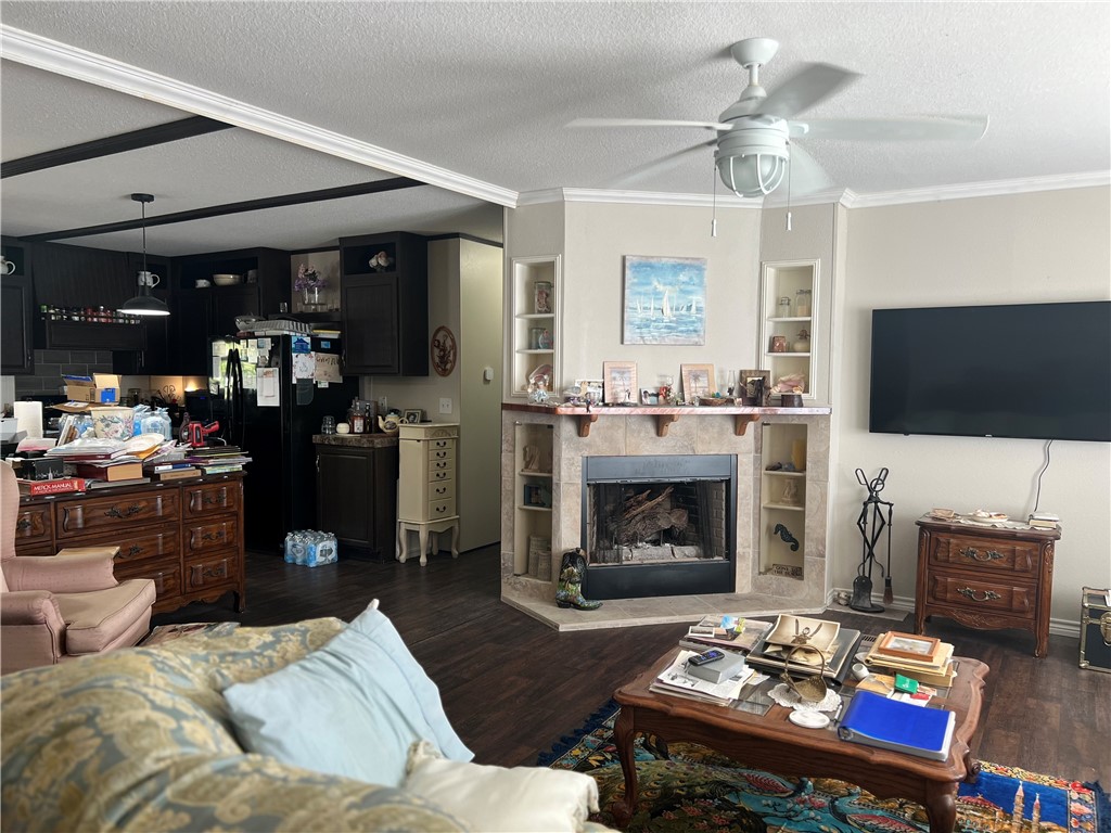 802 1st Street Bayside, TX 78340 - Photo 15 of 22 a living room with furniture and a flat screen tv