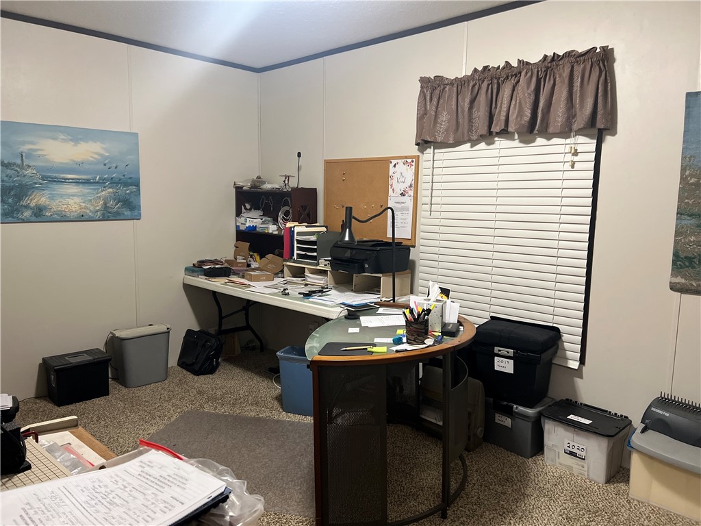 802 1st Street Bayside, TX 78340 - Photo 20 of 22 a dining room with furniture and wooden floor