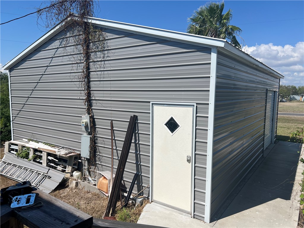 802 1st Street Bayside, TX 78340 - Photo 6 of 22 a front view of a house with balcony