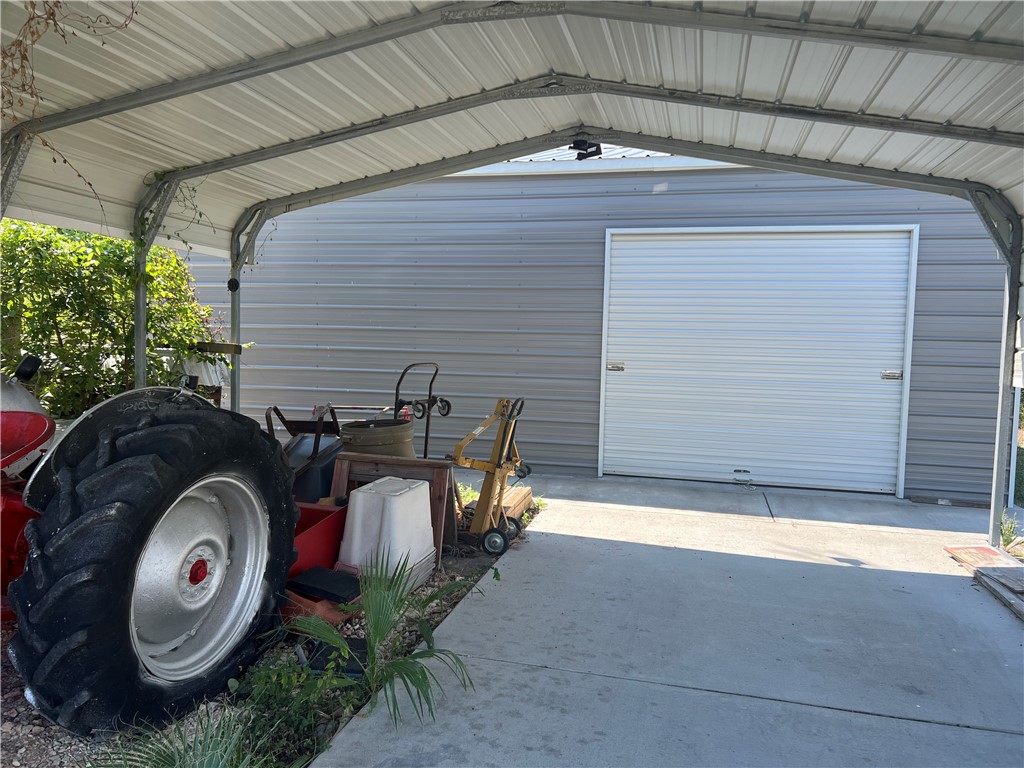 802 1st Street Bayside, TX 78340 - Photo 7 of 22 a view of a house with a backyard