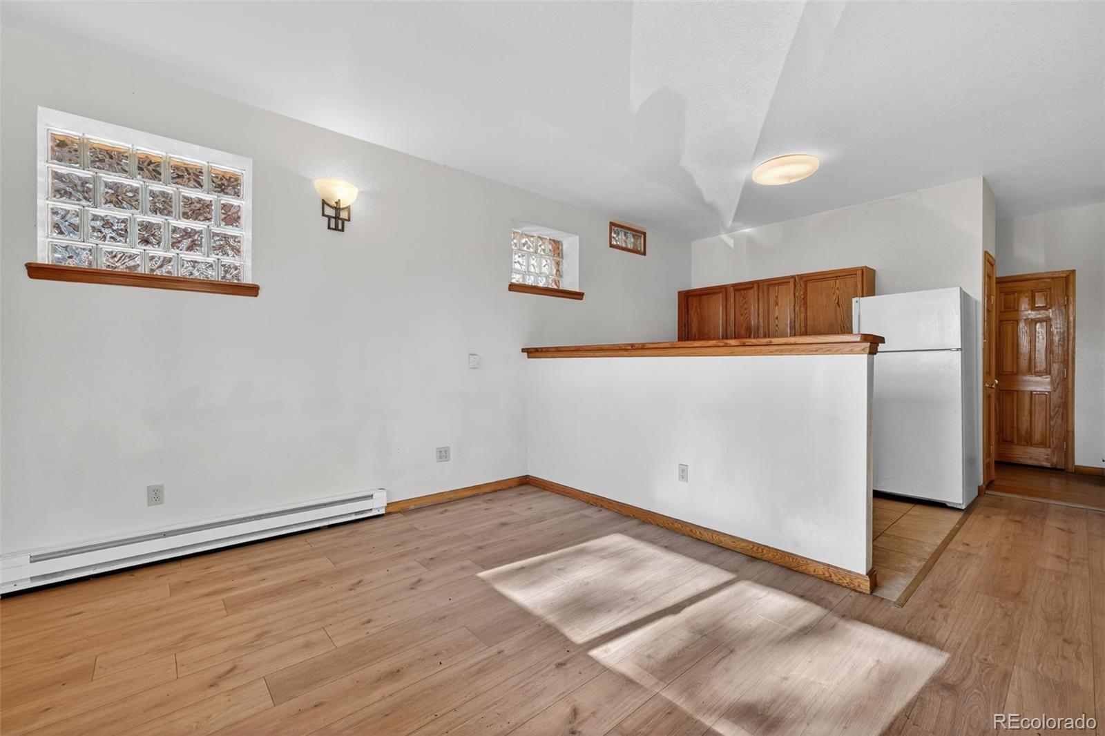 3581 Gap Road Golden, CO 80403 - Photo 25 of 45 a view of empty room with wooden floor