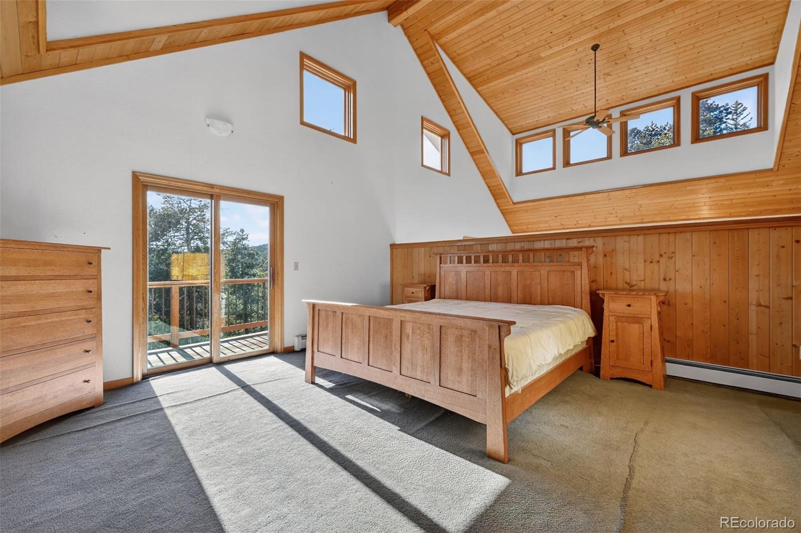 3581 Gap Road Golden, CO 80403 - Photo 7 of 45 a bedroom with a bed and a window