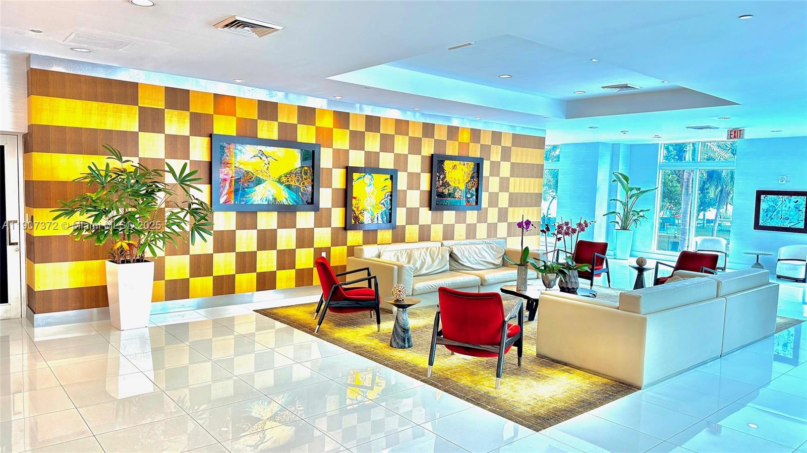 1800 North Bayshore Drive, Unit 1906 Miami, FL 33132 - Photo 3 of 21 a living room with furniture and a floor to ceiling window