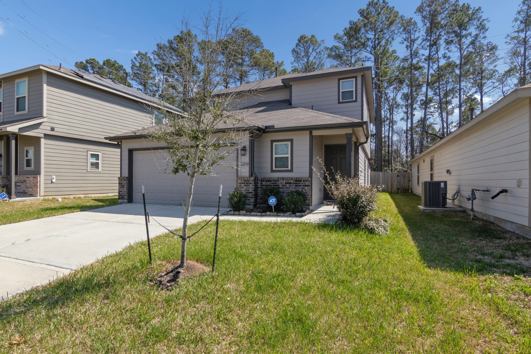 2250 Yelverton Ter Trail Spring, TX 77373 - Photo 2 of 30 a house view with a garden space