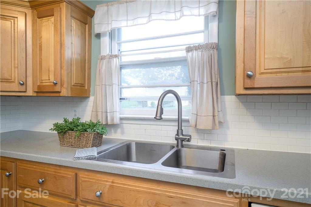 2289 Claremont Road Newton, NC 28658 - Photo 13 of 20 a kitchen with sink and window