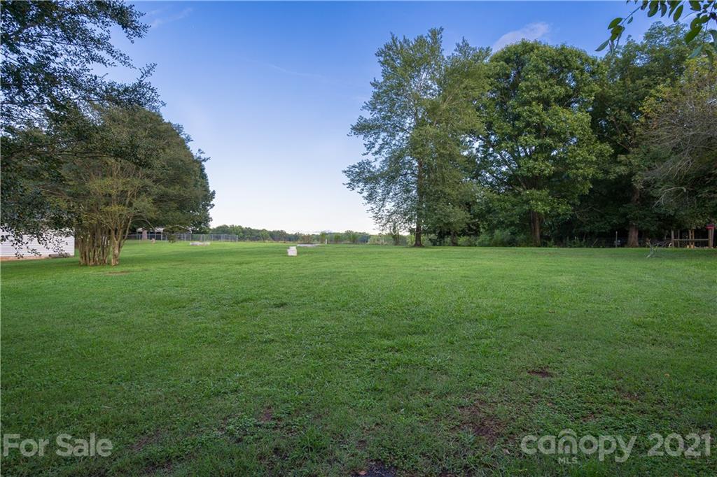 2289 Claremont Road Newton, NC 28658 - Photo 8 of 20 a view of a green field