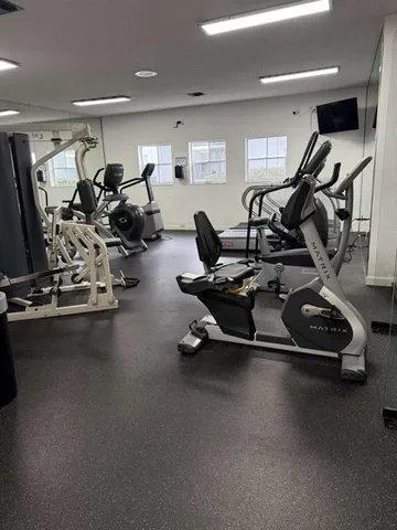 a view of a room with gym equipment