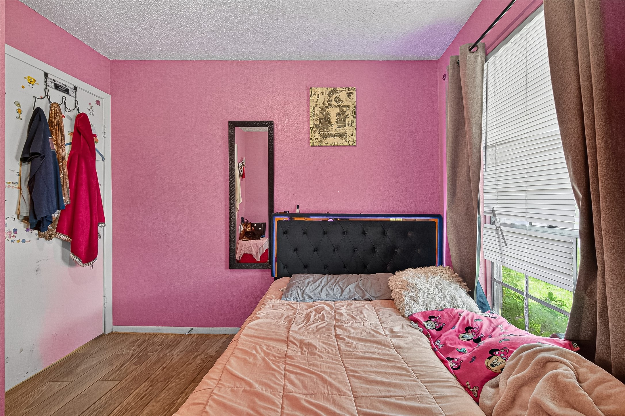 4814 Ridgestone Street Houston, TX 77053 - Photo 19 of 29 a bedroom with a bed and a window