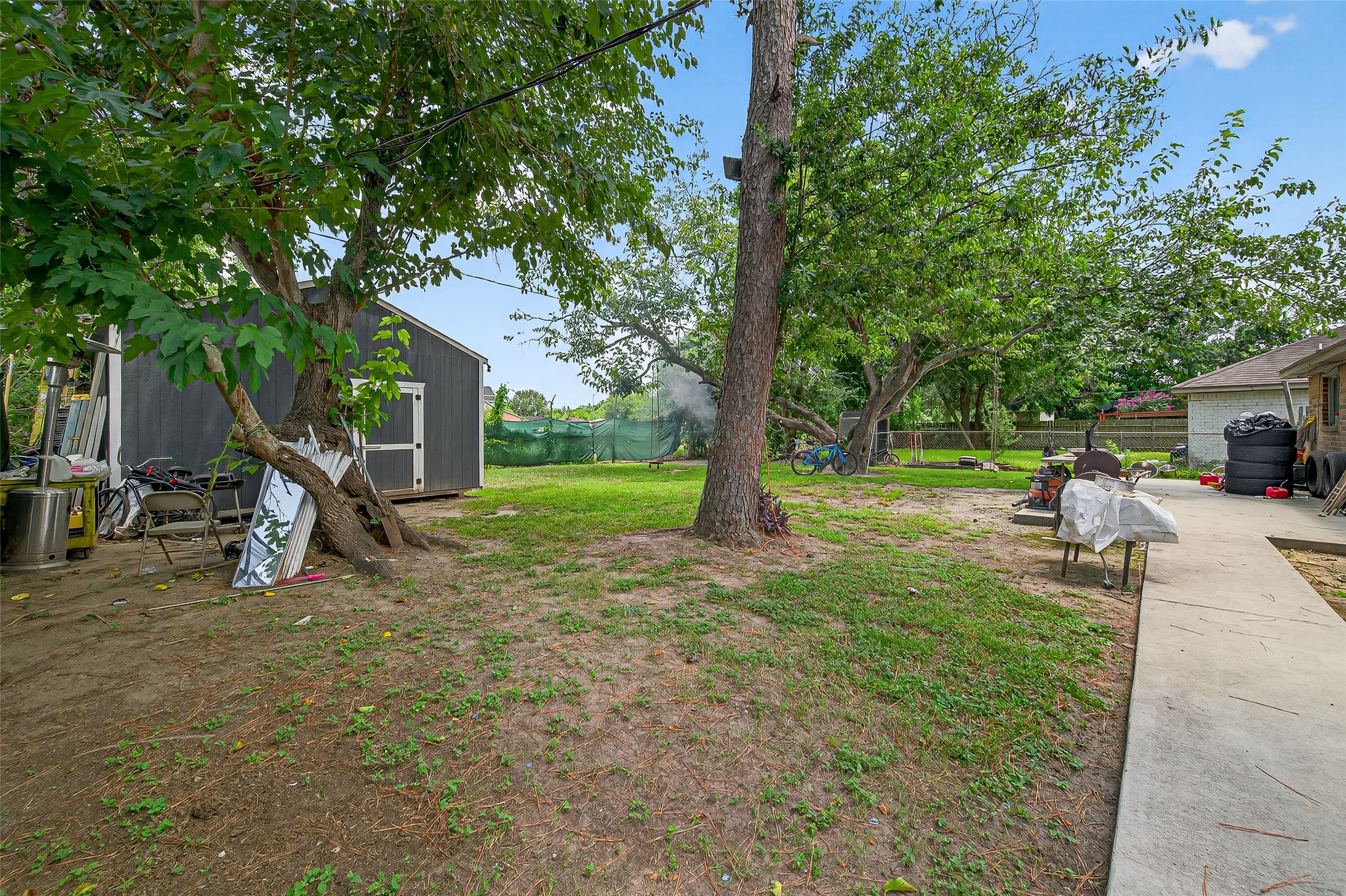 4814 Ridgestone Street Houston, TX 77053 - Photo 27 of 29 a view of a tree in front of a house