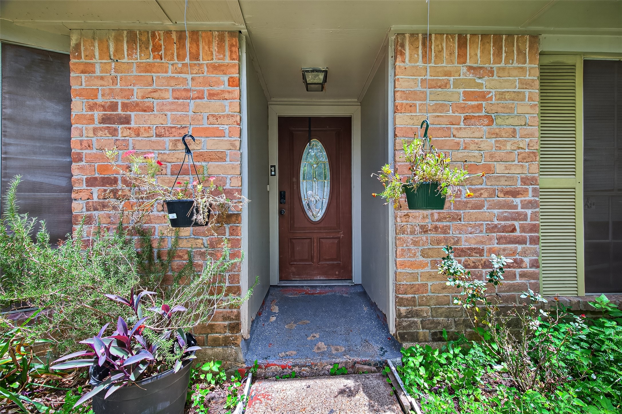 4814 Ridgestone Street Houston, TX 77053 - Photo 8 of 29 a front view of a house with a garden