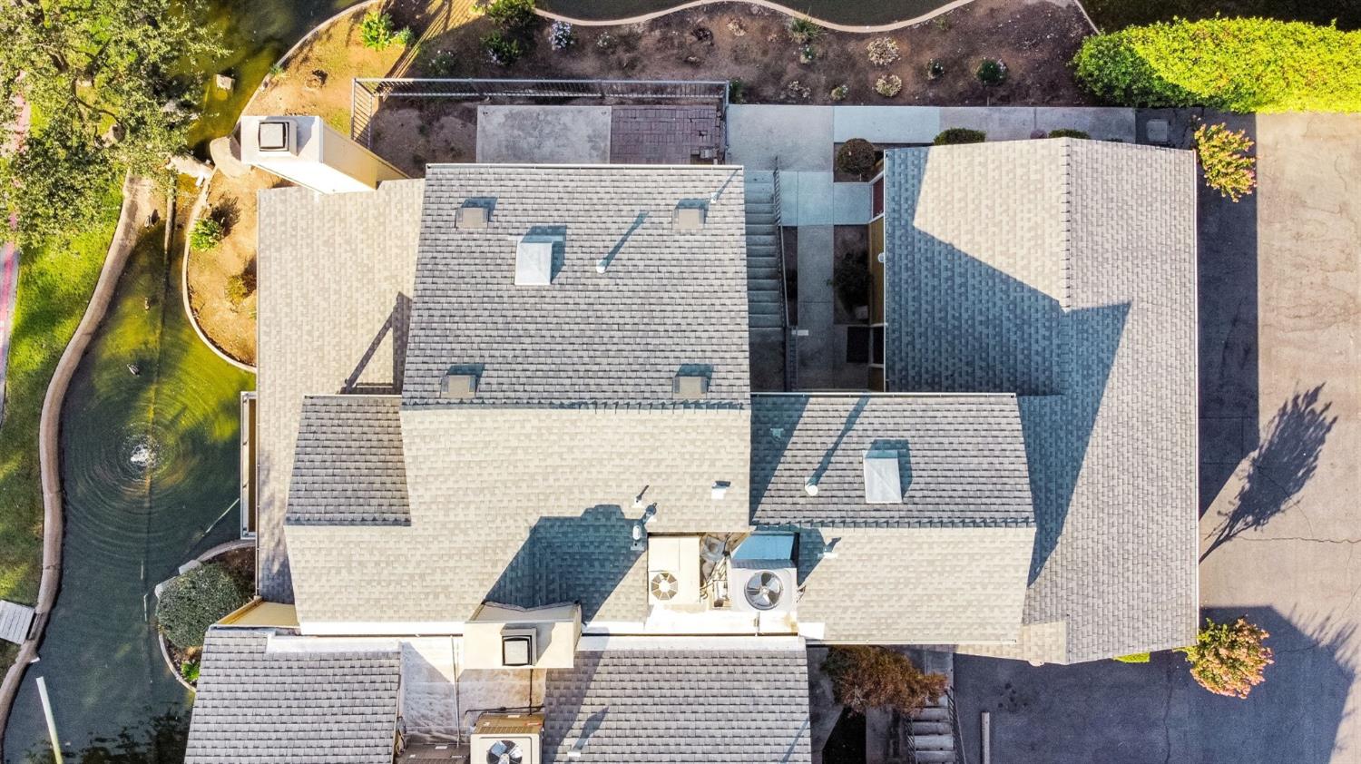 7675 North First Street, Unit 136 Fresno, CA 93720 - Photo 41 of 42 an aerial view of residential houses with outdoor space