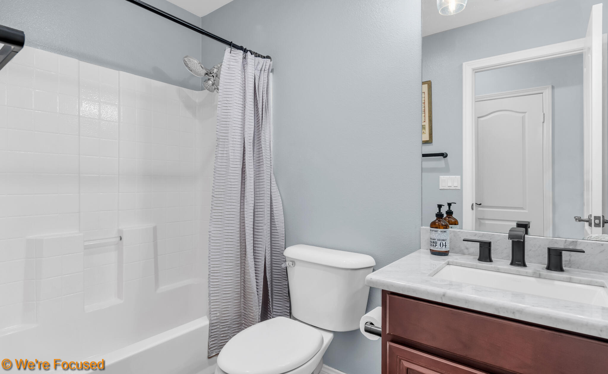 33856 Augusta Circle Yucaipa, CA 92399 - Photo 11 of 55 a bathroom with a sink toilet vanity and shower