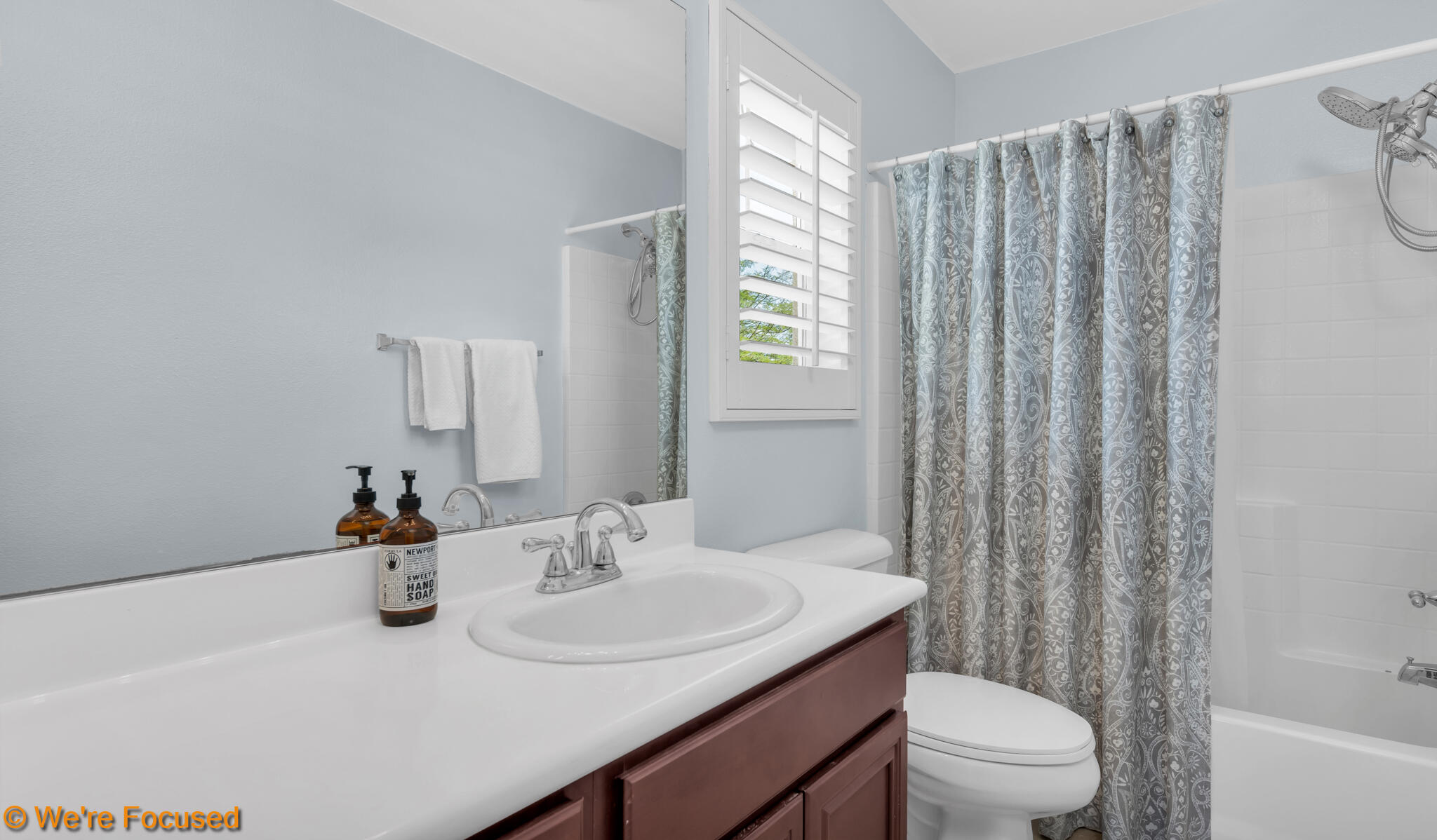 33856 Augusta Circle Yucaipa, CA 92399 - Photo 17 of 55 a bathroom with a sink toilet and shower
