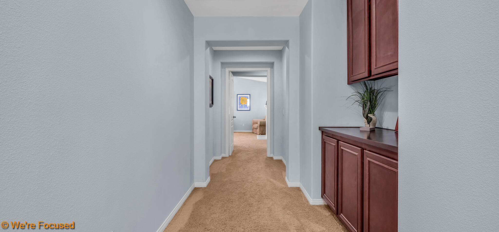 33856 Augusta Circle Yucaipa, CA 92399 - Photo 18 of 55 a view of a hallway with wooden floor