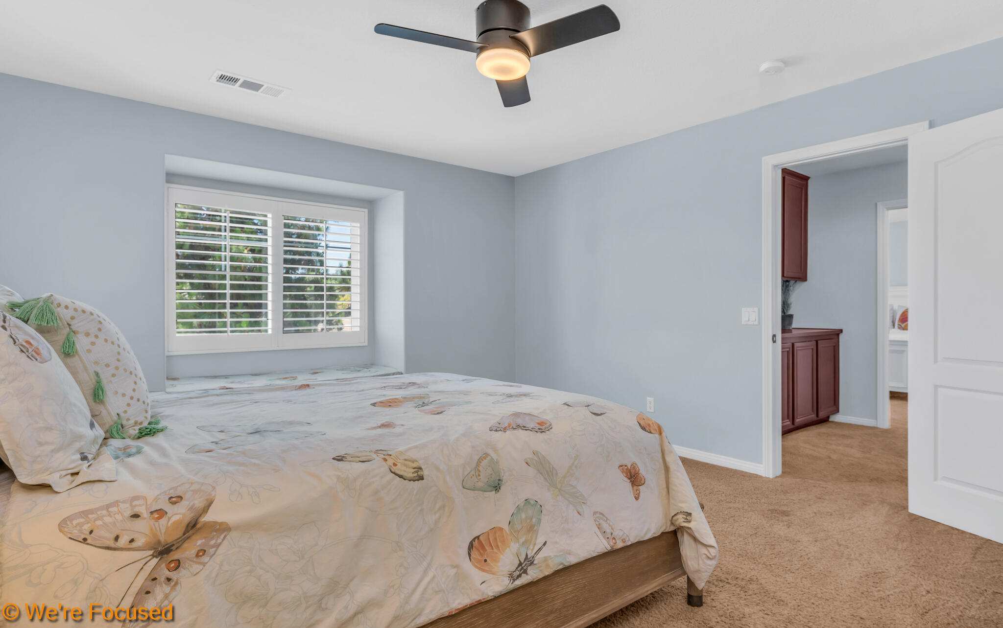 33856 Augusta Circle Yucaipa, CA 92399 - Photo 26 of 55 a bedroom with a bed and window
