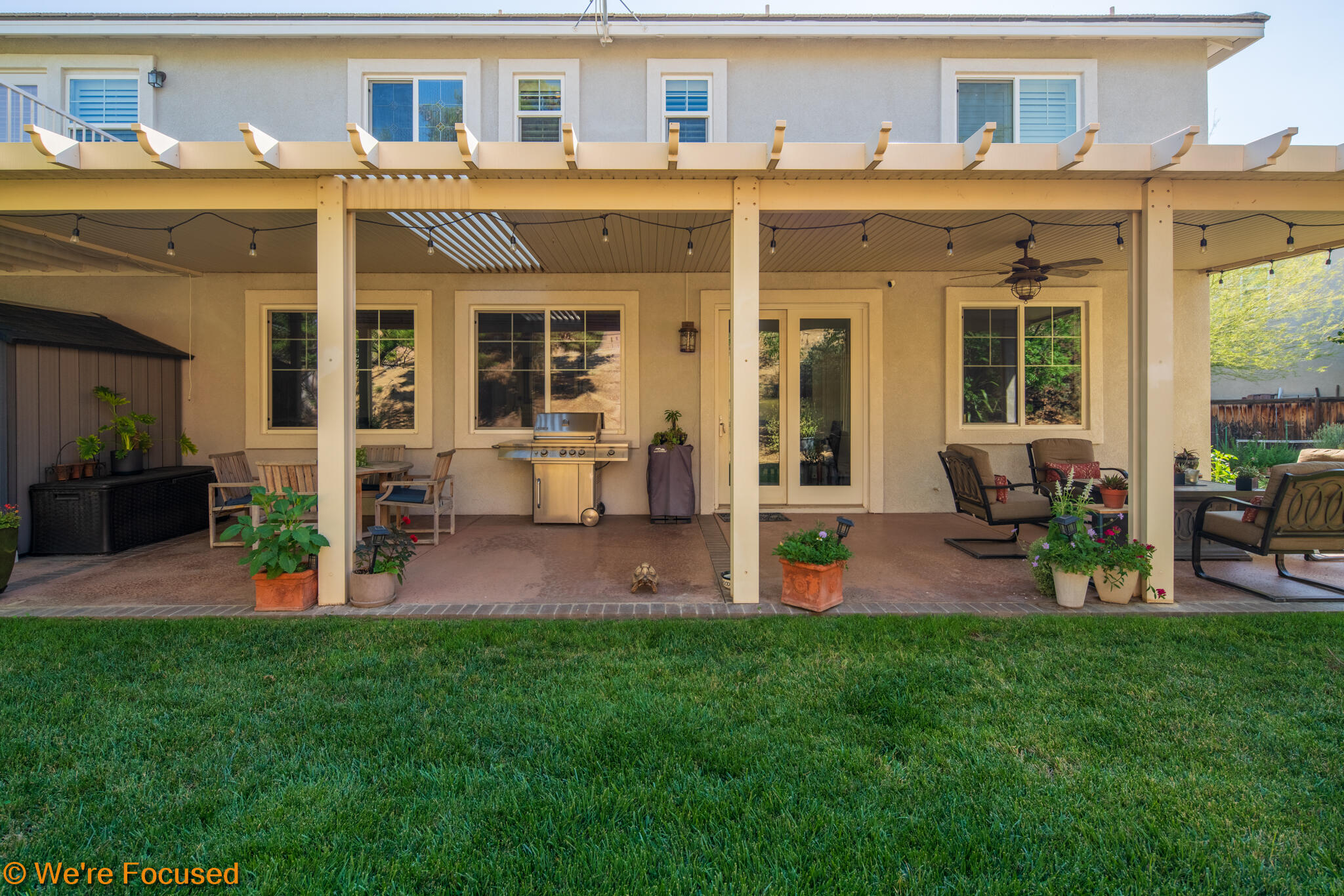 33856 Augusta Circle Yucaipa, CA 92399 - Photo 34 of 55 a front view of house with outdoor seating and yard